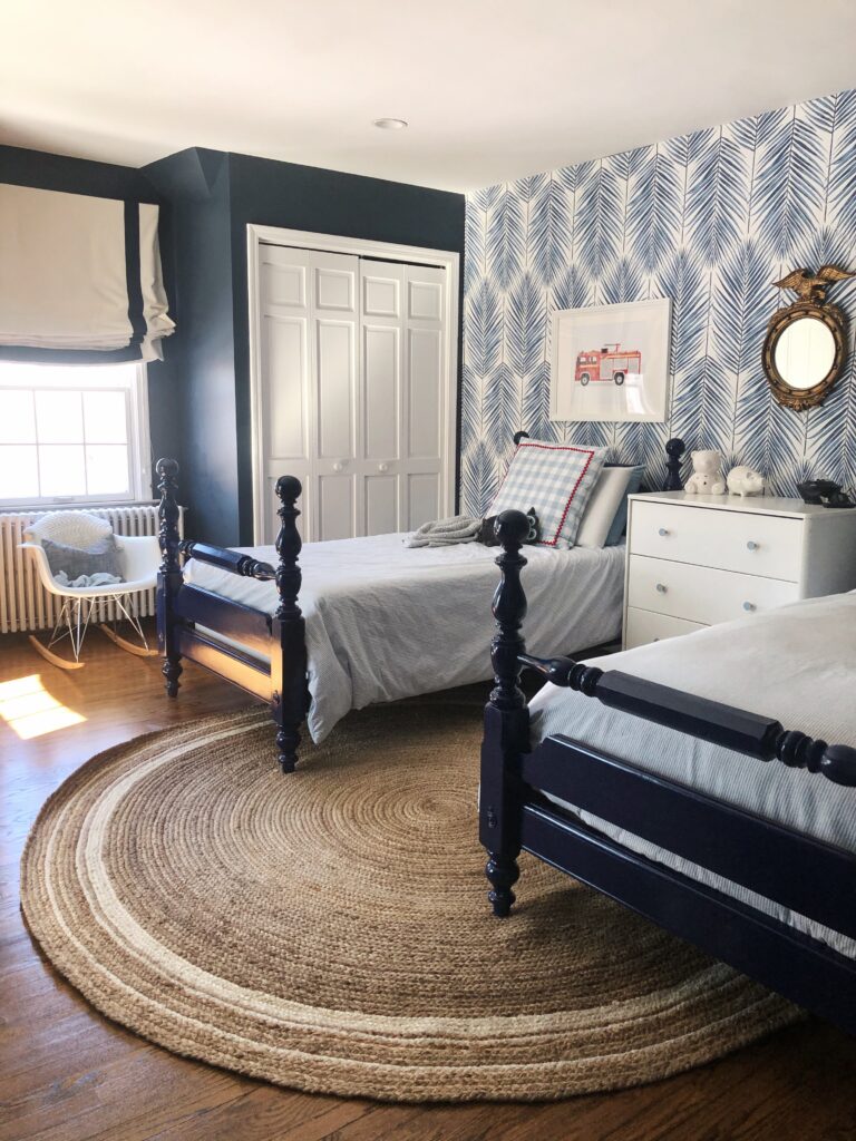 A traditional blue boys room with twin beds