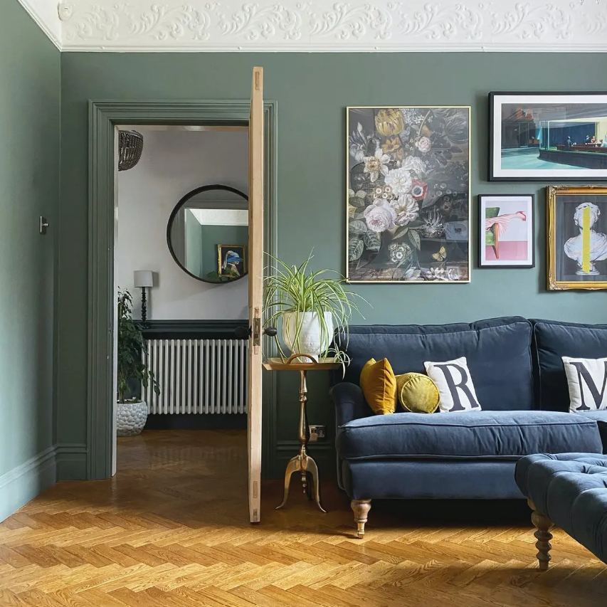 https://kaitlinmadden.com/wp-content/uploads/2022/09/best-sage-green-paint-slate-blue-sofa.png