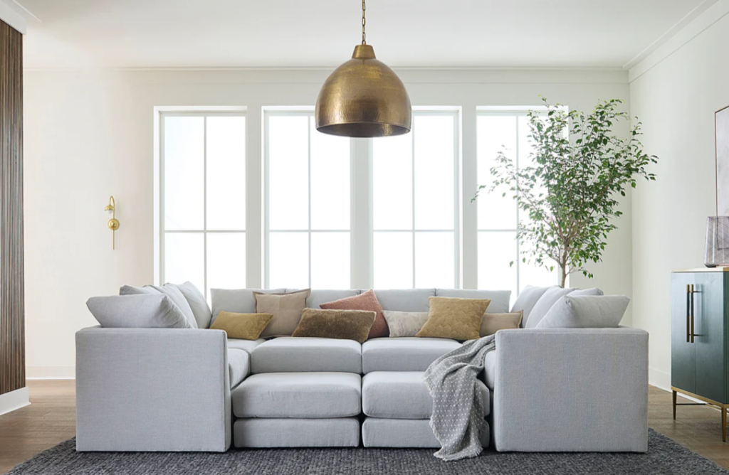 Large gray sectional sofa in a white living room