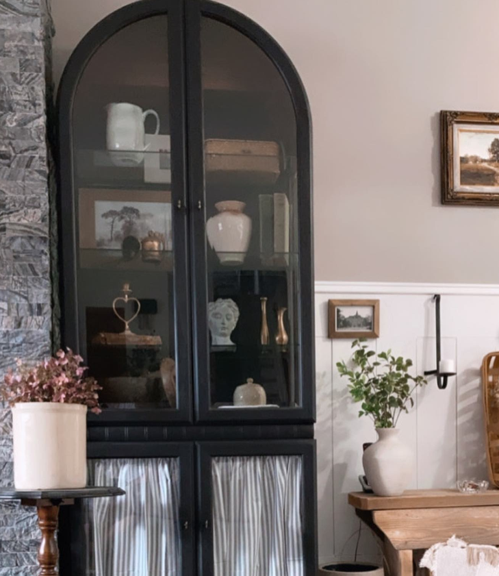 arched cabinet in a living room