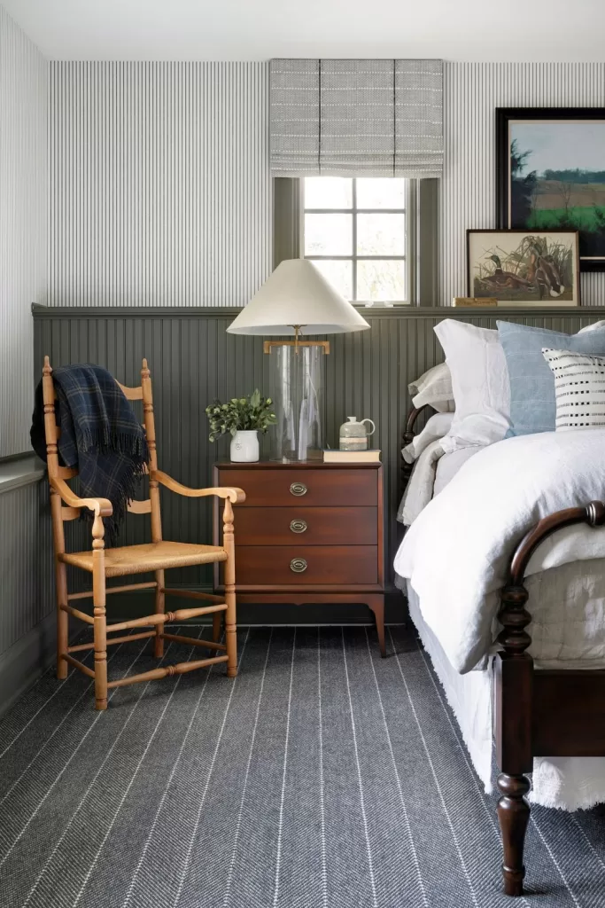 bedroom with farmhouse elements and green accent wall