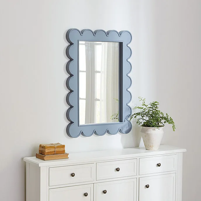 white console table with blue mirror on top