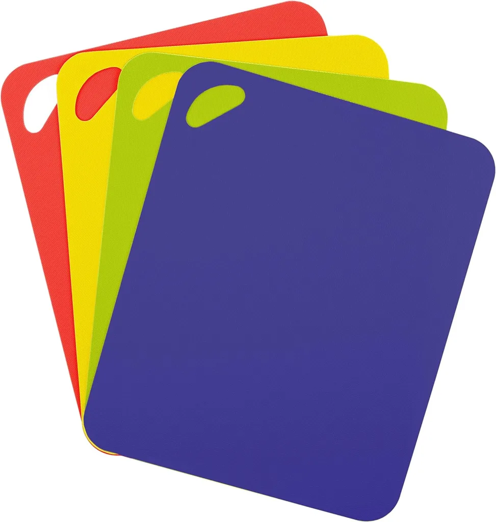 four plastic colorful cutting boards